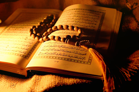 حكم غناء وتلحين آية من القرآن الكريم